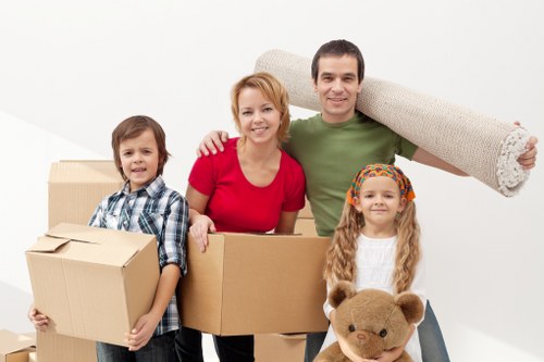 Professional movers transporting belongings from a South Kensington flat