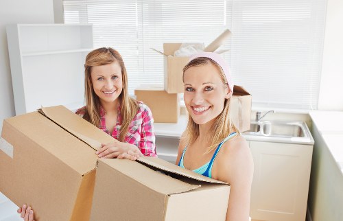 Local moving team navigating a South Kensington street with residential property access